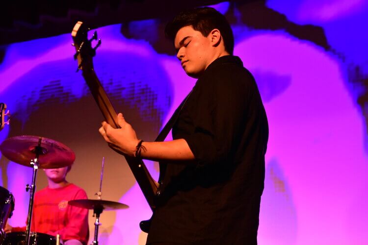 Fuzz Boy playing guitar